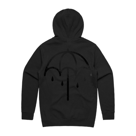 Washed black hoodie with a bold black umbrella print across the back
